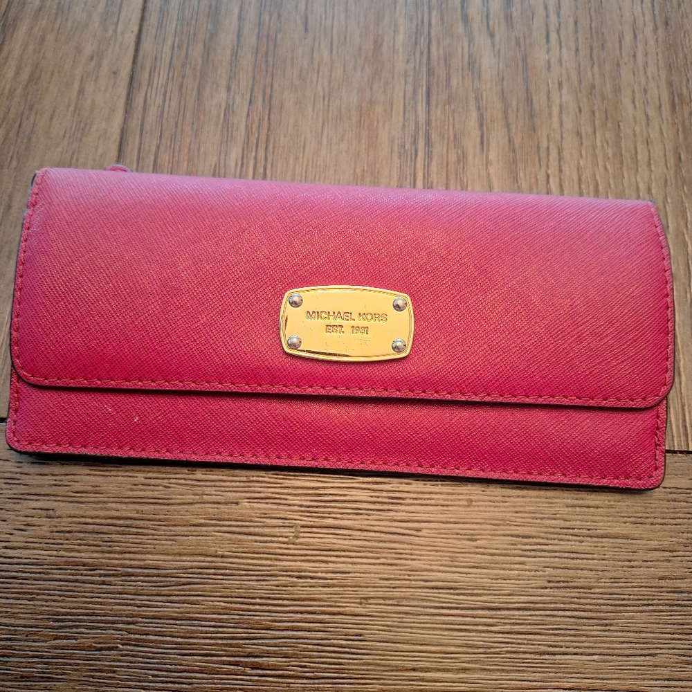 MICHAEL KORS red leather wallet.